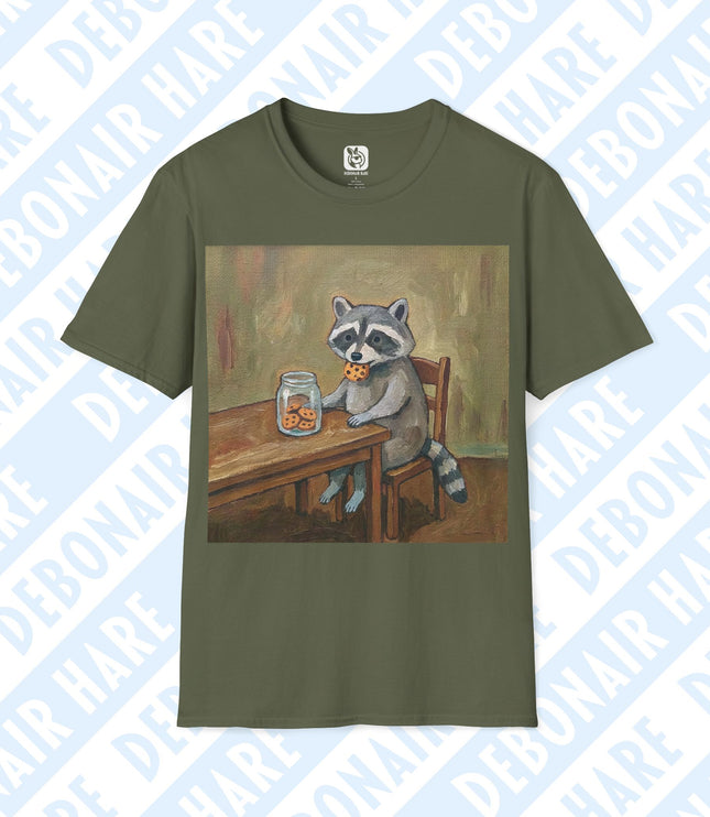 Military green t-shirt depicting a raccoon sitting at a table eating a cookie