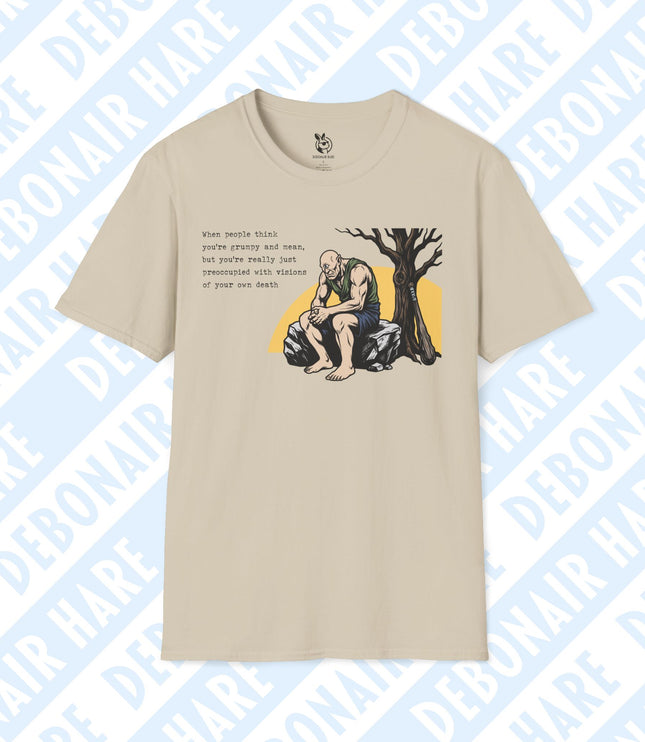 A sandy t-shirt featuring a cyclops contemplating his own foreseen demise.