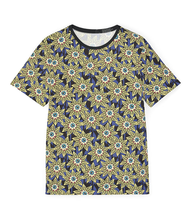 The front of a soft polyester sports jersey featuring a pattern of eyeballs with yellow flower petals.