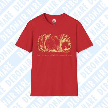 A red tshirt depicting a lonely cave with a single lantern, with the text "You are in a maze of twisty little passages, all alike."