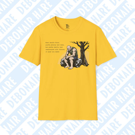 A yellow t-shirt featuring a cyclops contemplating his own foreseen demise.