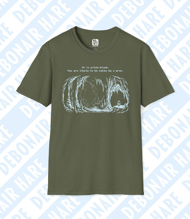 A military green t-shirt with an image of a lonely cave and the text "It is pitch black. You are likely to be eaten by a grue."